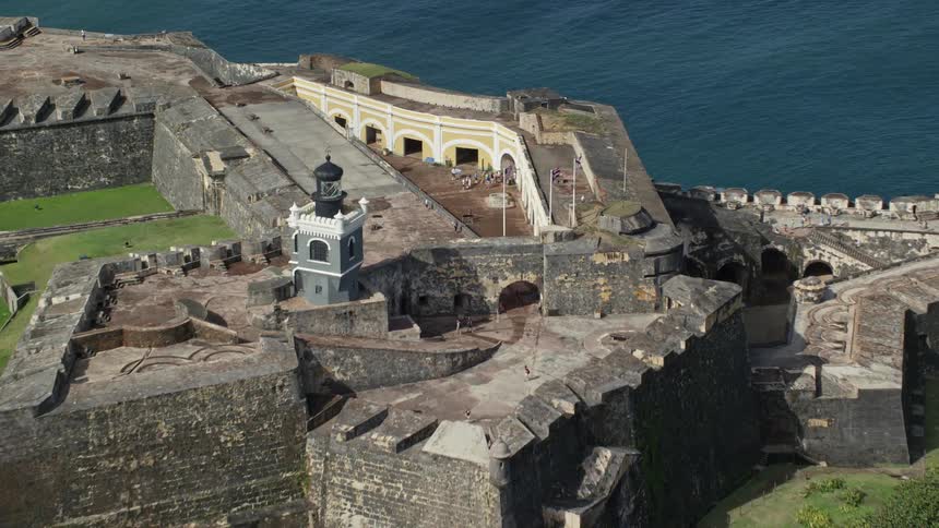 Tourists visit a giant coastal fort