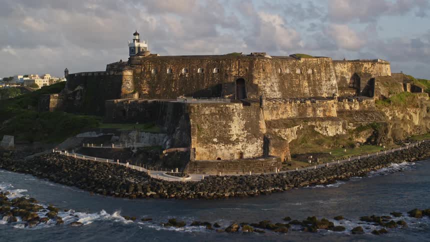 An ancient stone fortress facing the sea on a coast