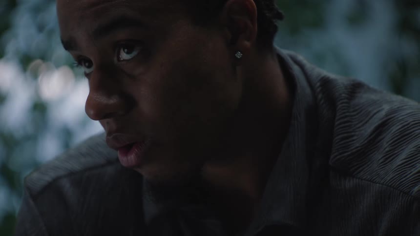 Close up of the face of a man looking up
