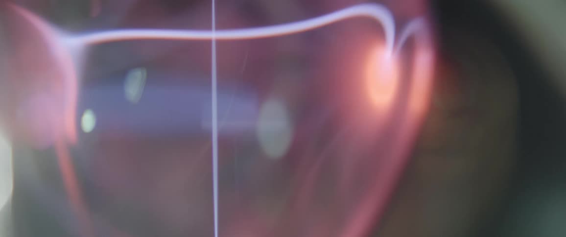 A sphere of purple electricity glowing brightly