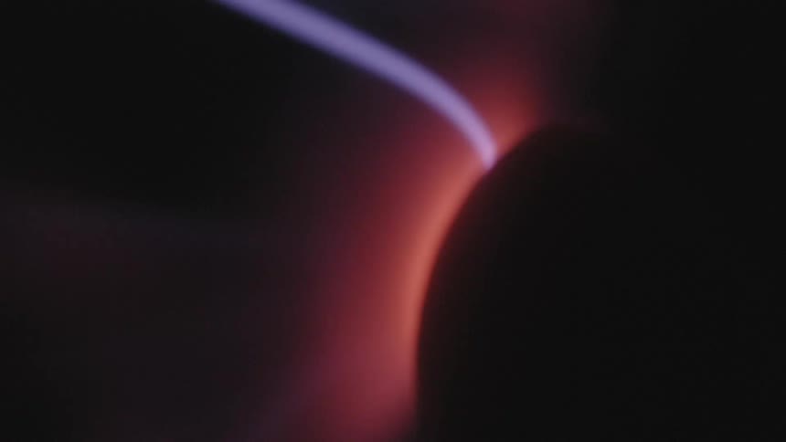 Extreme close up on abstract neon magnetic waves