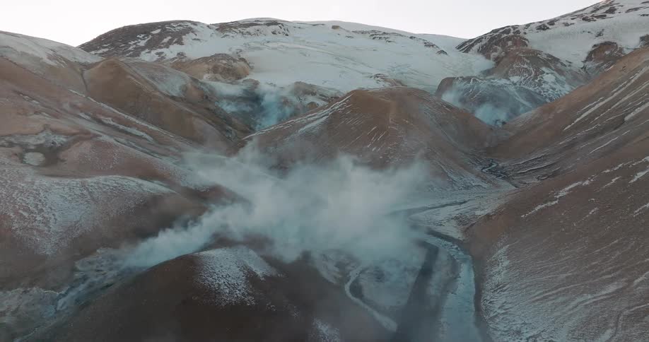 Aerial of a volcanic mountain valley during winter