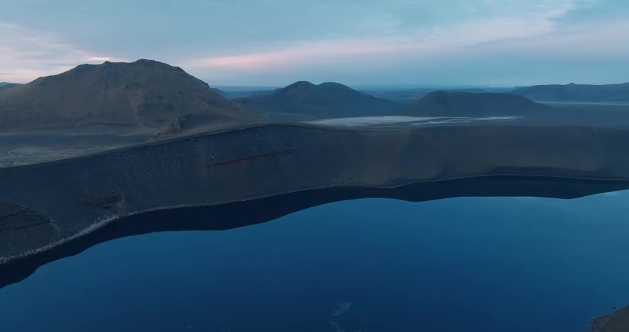 Aerial of a deserted lake during dusk