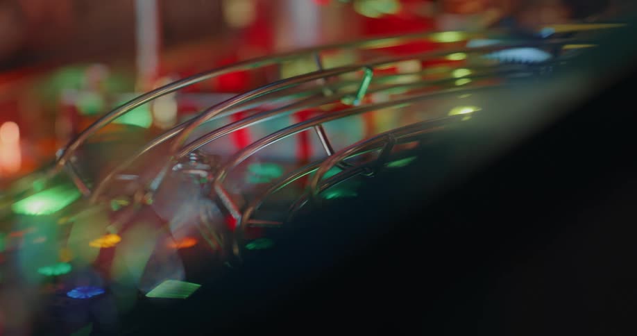 Closeup of the iron grille of an arcade machine
