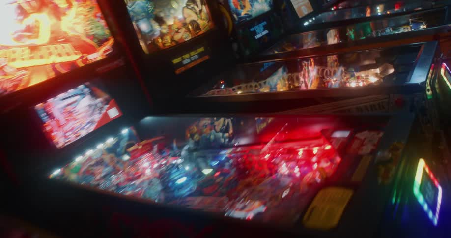A room with an arcade game machine