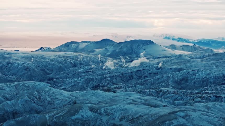 An aerial clip of an ice arctic mountain