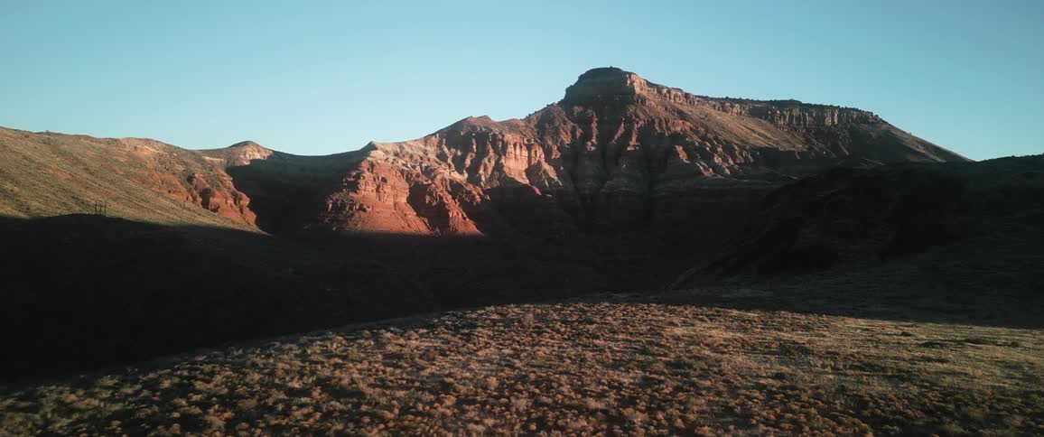 A desert plain overlooking a mountain