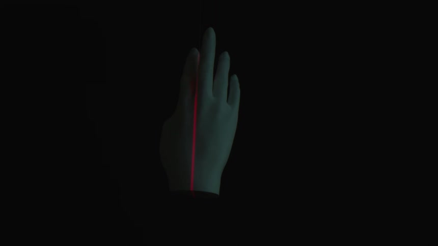Abstract hand and circular movements with a red led light beam