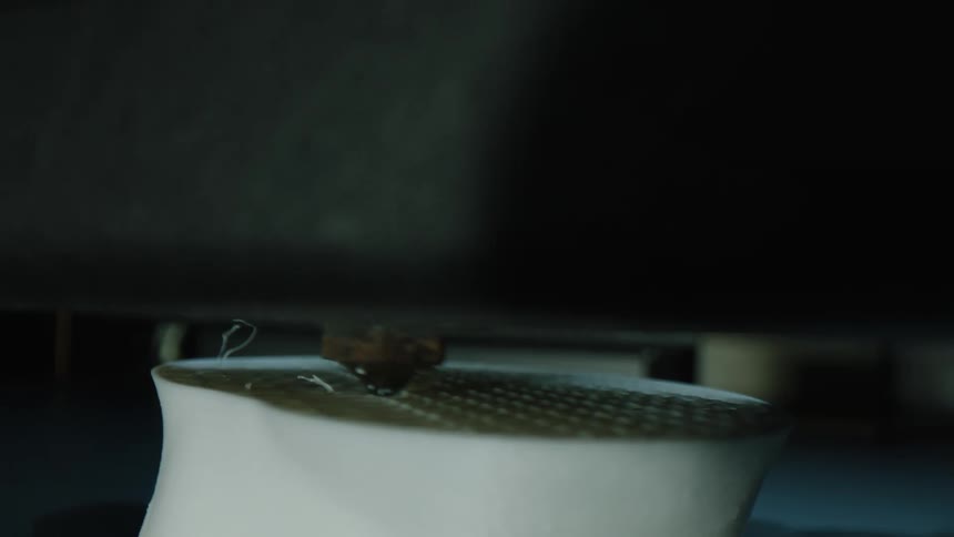A 3d printing machine creates a realistic object