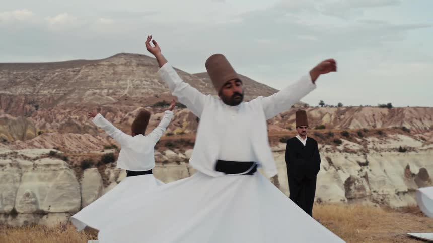 Whirling dervishes hold a religious ceremony in the Cappadocia region of Turkey