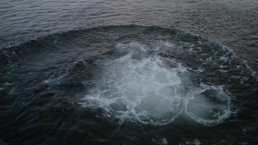Young man judging himself in the middle of the sea