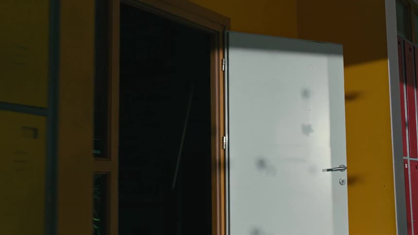 A shadow of a child is sneaking up on another shadow