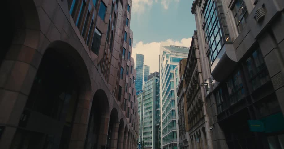 Street in a metropolis with skyscrapers during the day