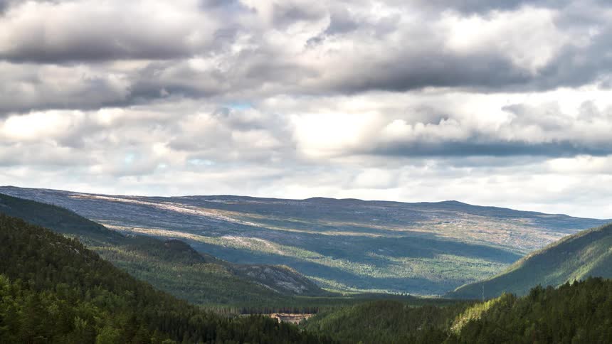 The clouds flow over the landscape