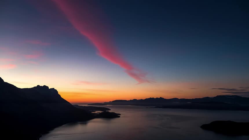 The sun sets on the mountains