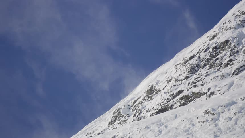 The mountain is covered with snow