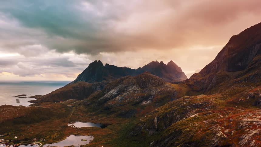 Mountain range near the sea at sunset
