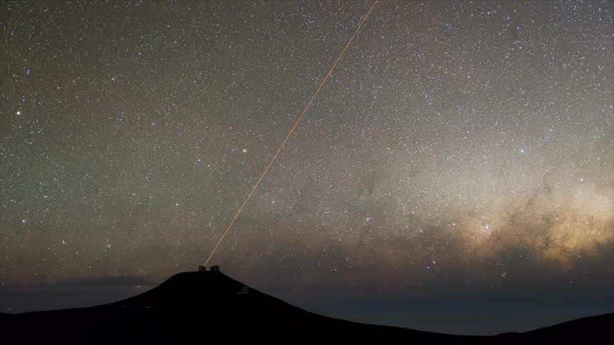 A telescope in a planetarium observing the starry sky