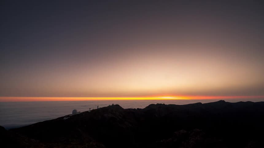 The sun rises over the ocean