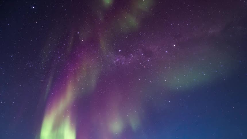 The aurora shines in the night sky