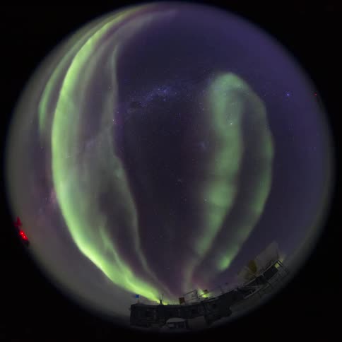 fisheye view of the sky with Aurora Australis