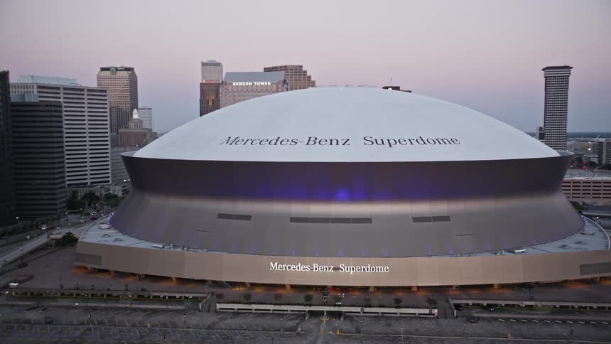 Skyline of a stadium in an urban city during sunset