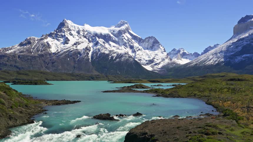 A clip of a flowing river and an ice mountain