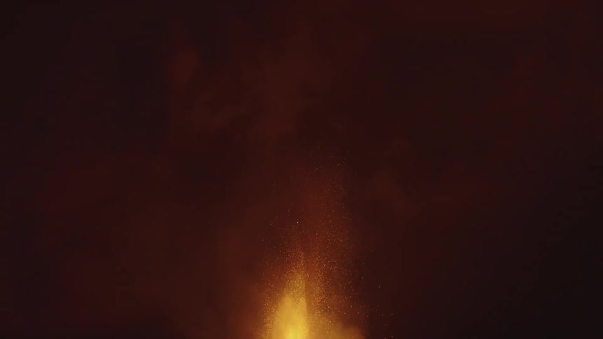 A volcanic eruption lightens a dark sky