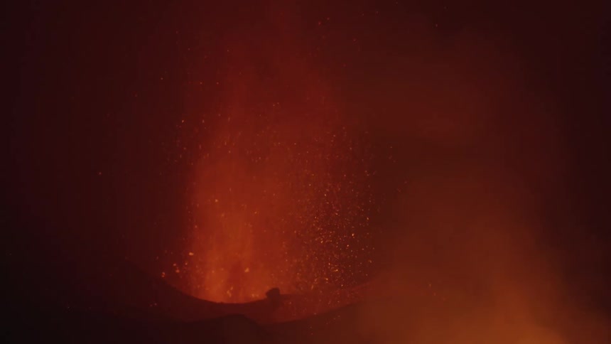 Lava shoots into the air from a volcanic eruption