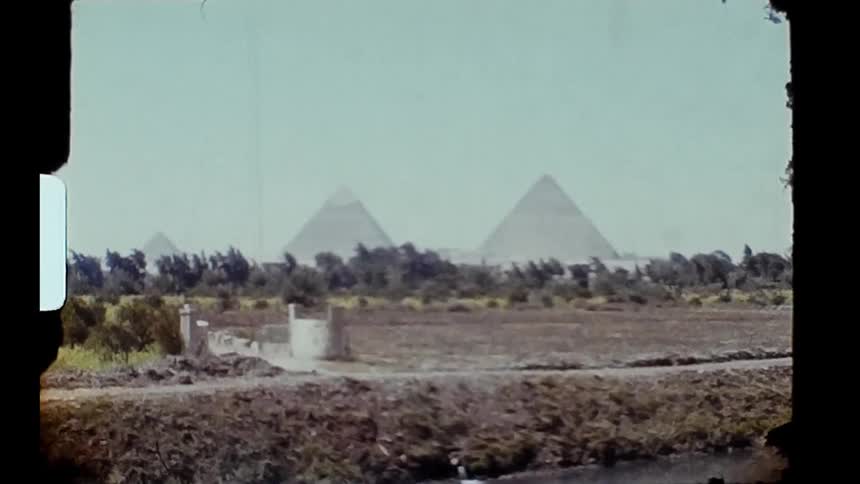 A very old image of pyramids on the horizon