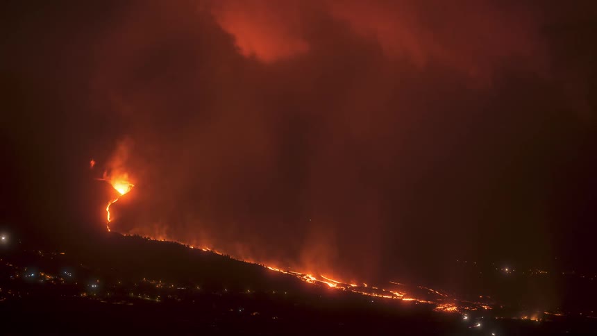 The volcano lava runs through the town