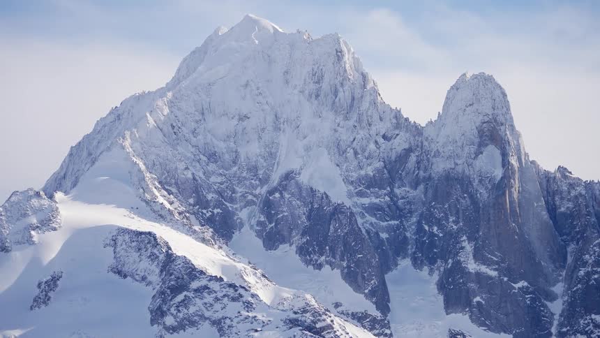 A snowy mountain peak