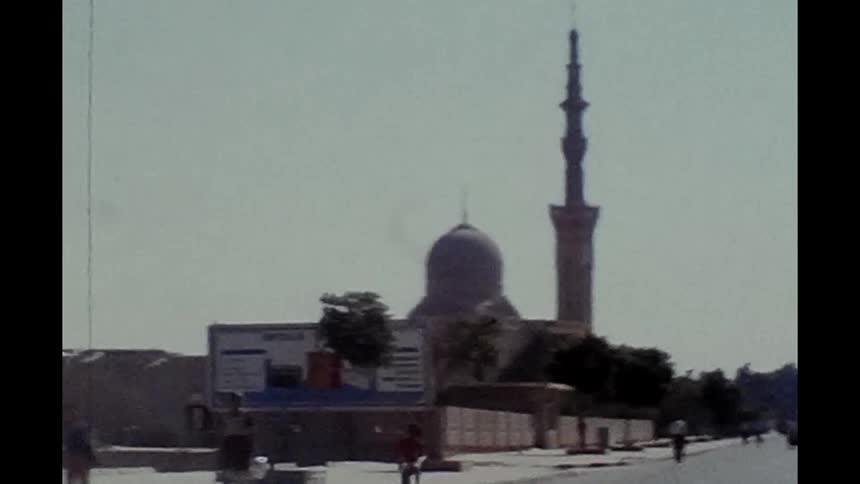 An old image of a touristic architecture building with a tower