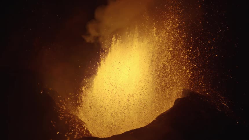 A volcano emits a large amount of lava