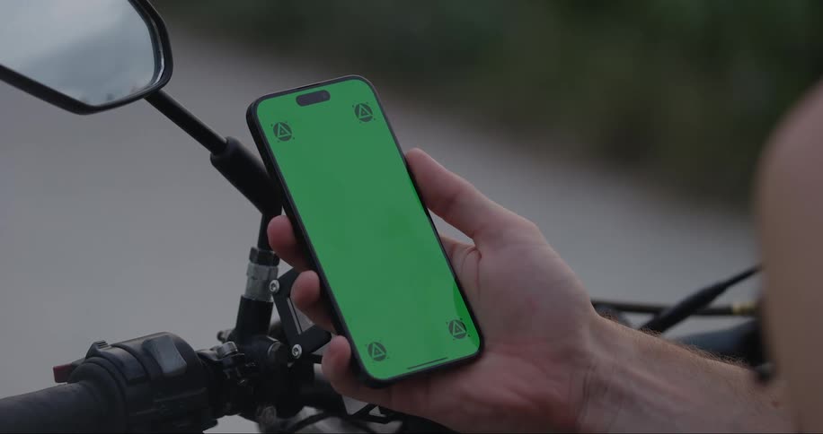 A man scrolls on a smart phone