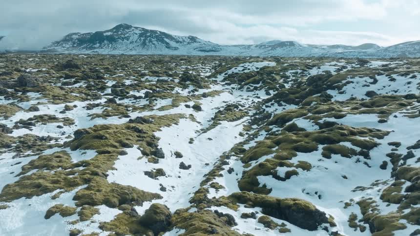A mountain range is in the distance