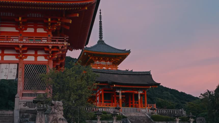 A peaceful scene at a japanese temple during sunset