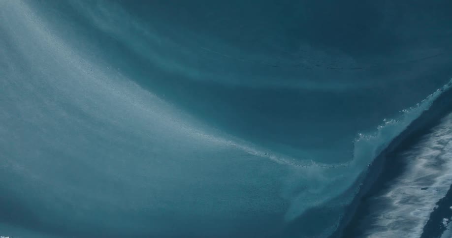 The water is frozen by the shore