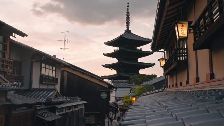A serene evening scene in a traditional japanese setting with a pagoda and classic architecture