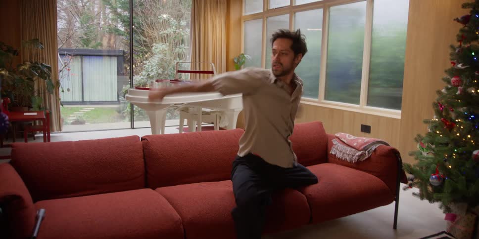 Man in living room dancing