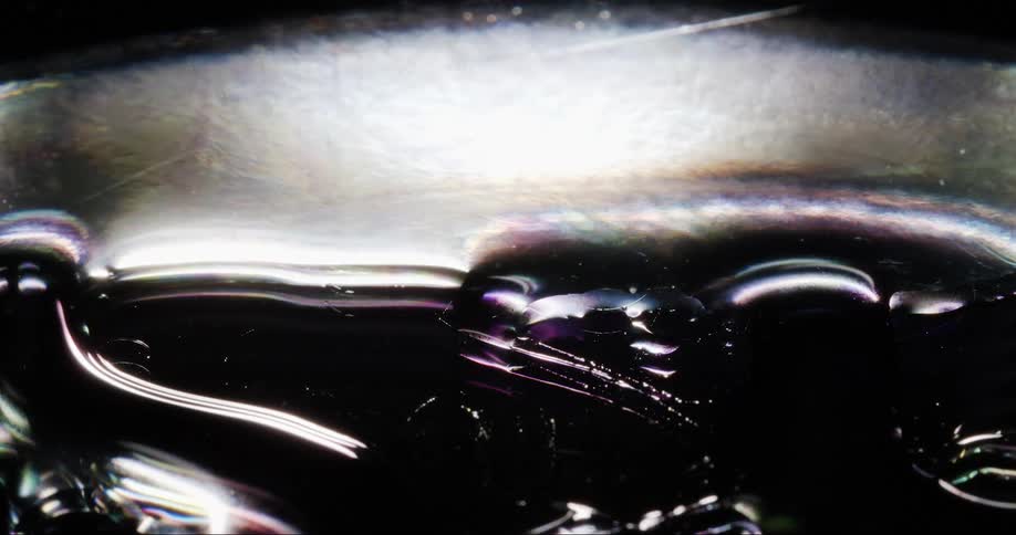 A black fluid bubbles