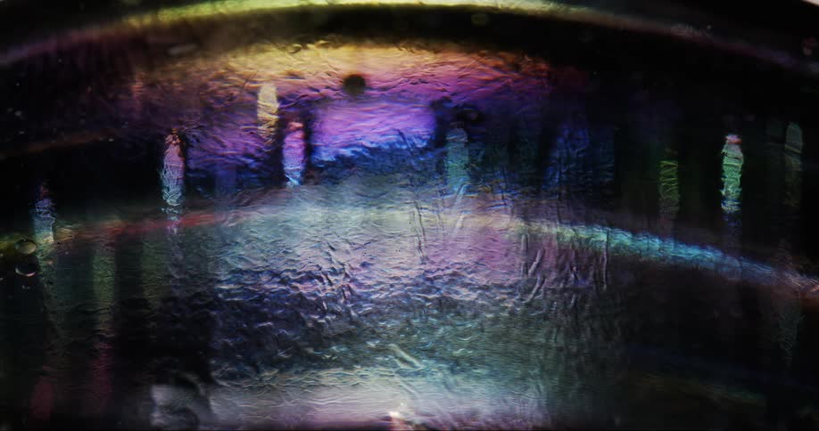 Fluid art with glowing liquid at night