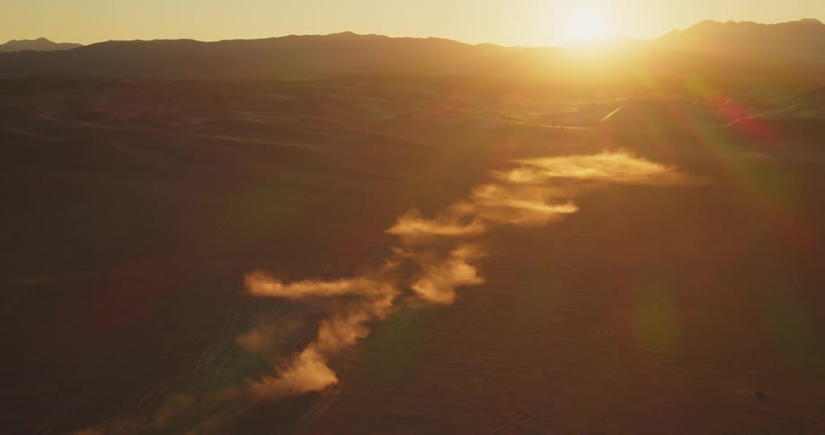 Desert aerial landscape with sunset on the horizon