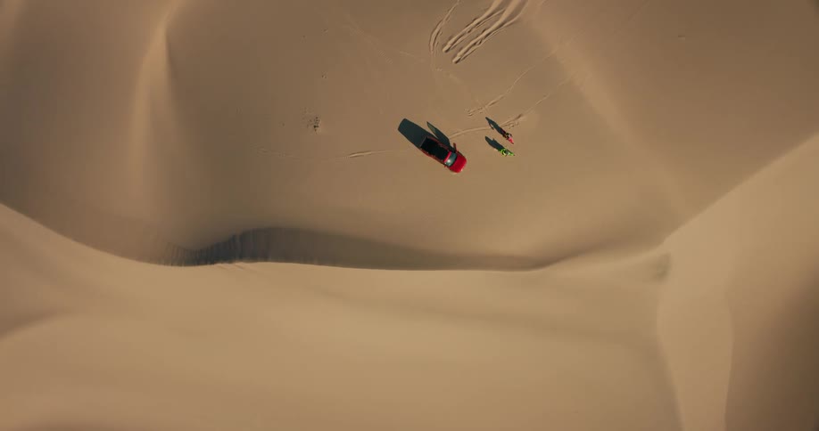 Suv and two motocross in a desert desert