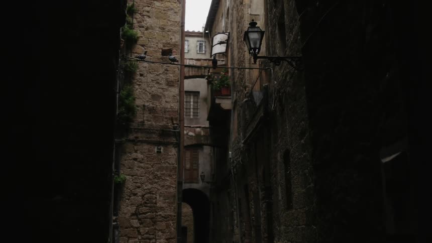 Small space between multi storied stone buildings