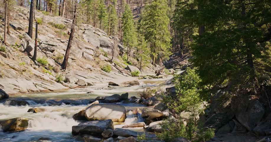 A river runs through a shallow rapid