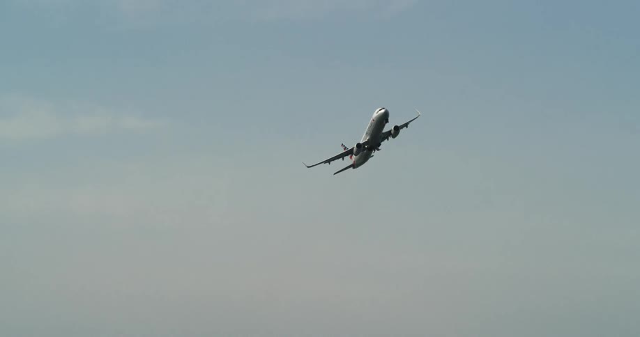 Airplane taking off into the sky