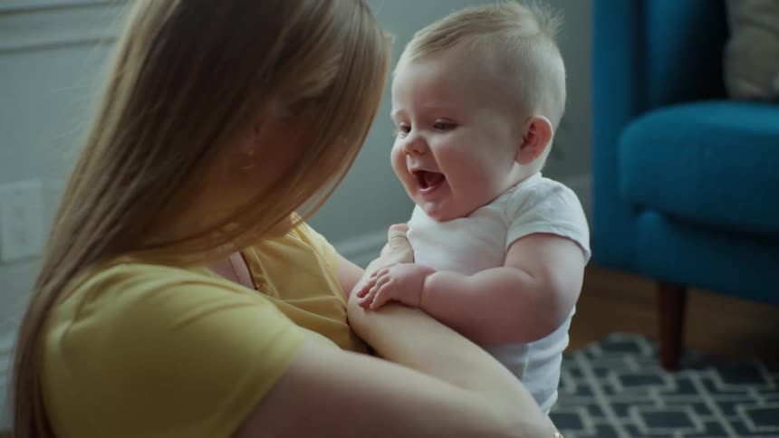 A clip of a mother tickling her son