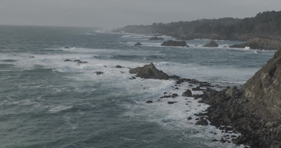 Natural landscape of a peninsula with water lapping at the shore