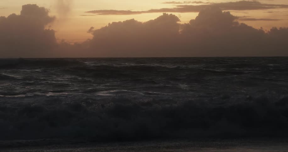 Seaside with choppy waves crashing on the shore